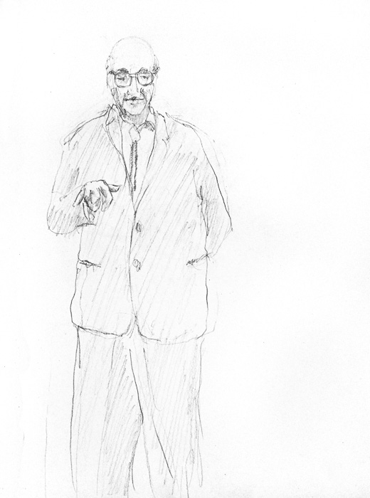 man explaining--strange gesture